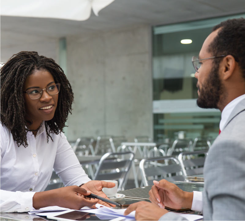 A person coaching another person